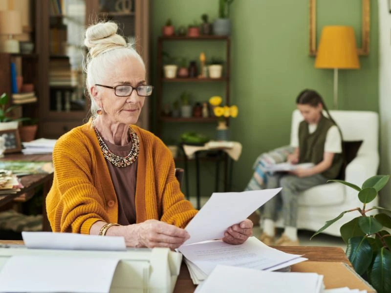 A senior reviewing a paper that answers "does roth conversion count as income for social security: