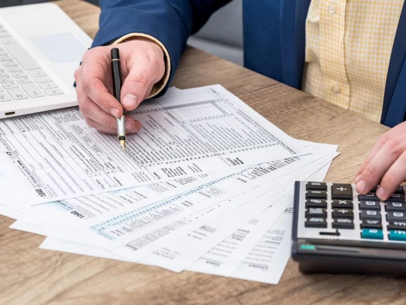 A CPA reviews tax preparation fees by form