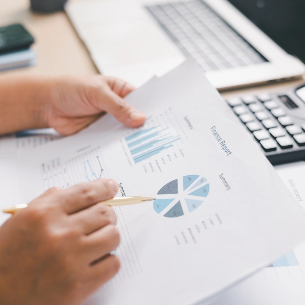 a business tax accounting in Raleigh reviews a finance report