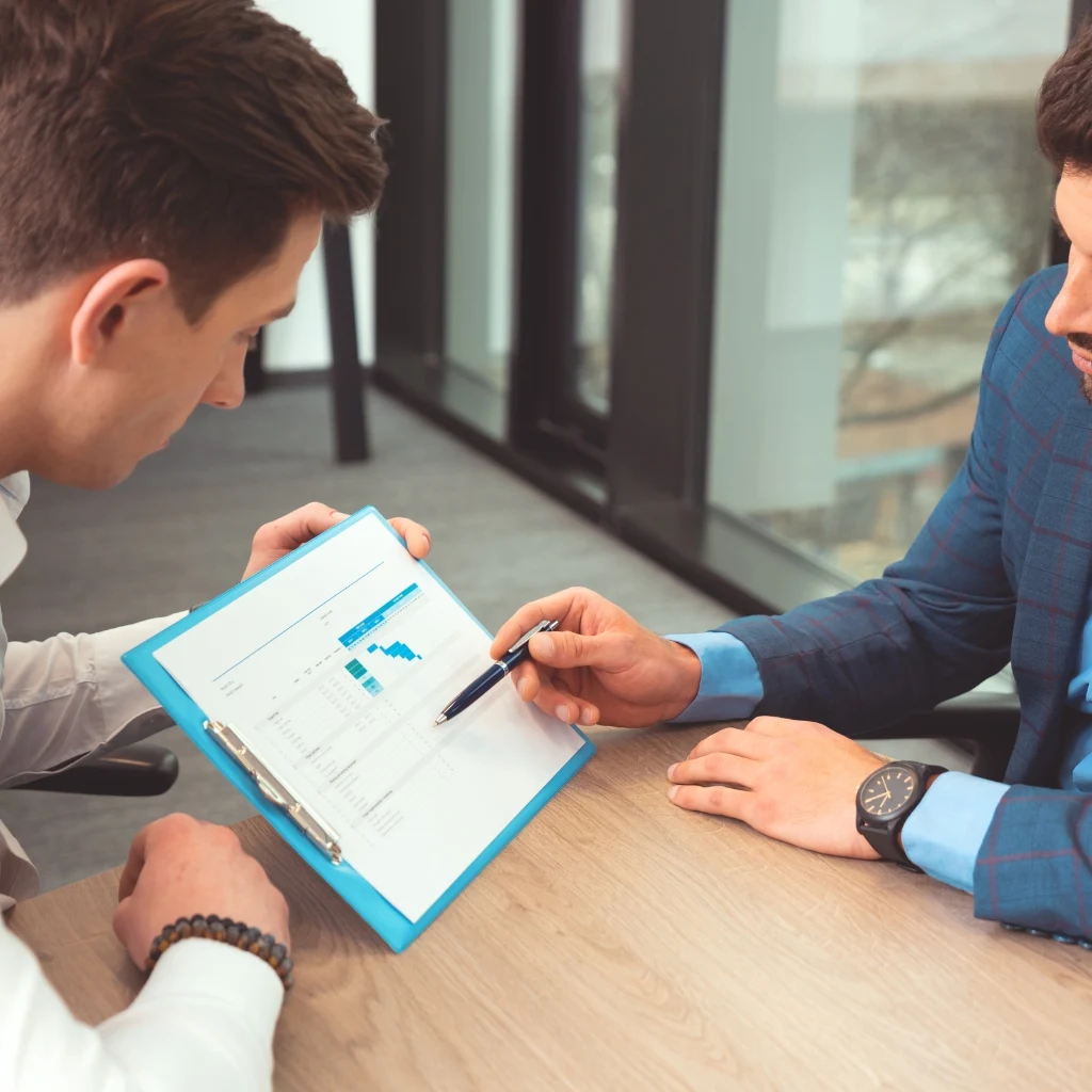 a client and CPA review tax documents as the CPA provides tax consulting advice in morrisville.